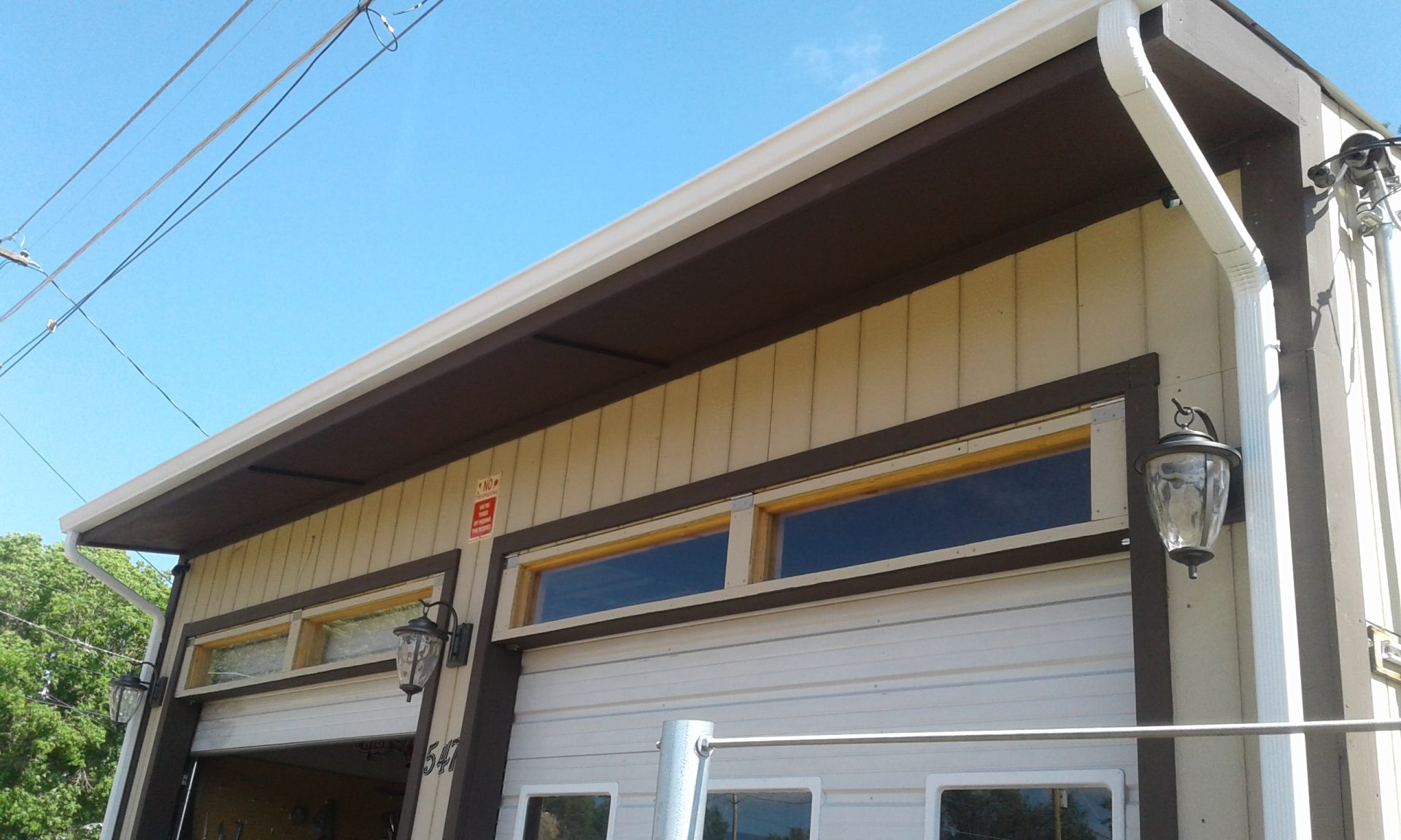 Exterior Soffit Construction, Painting, and Gutters
